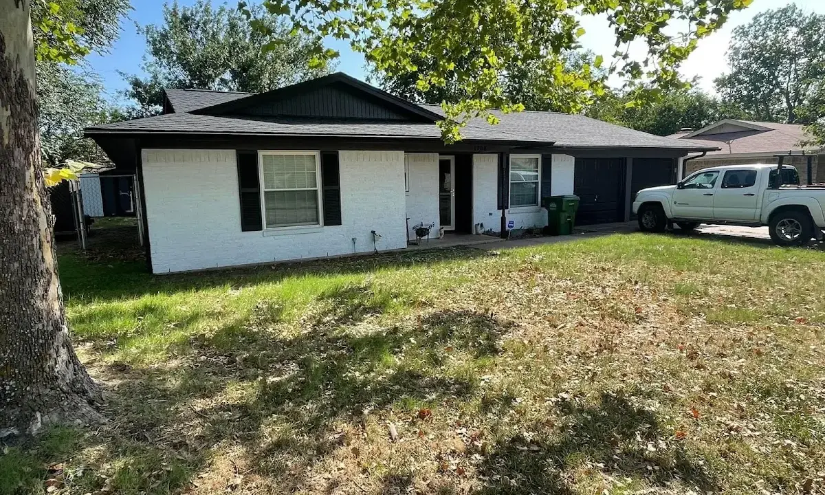 Professional roofing crew working on a residential roof in Philadelphia